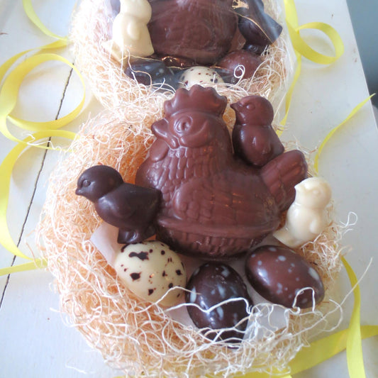 Hen in Nest with Chicks and Speckled Eggs